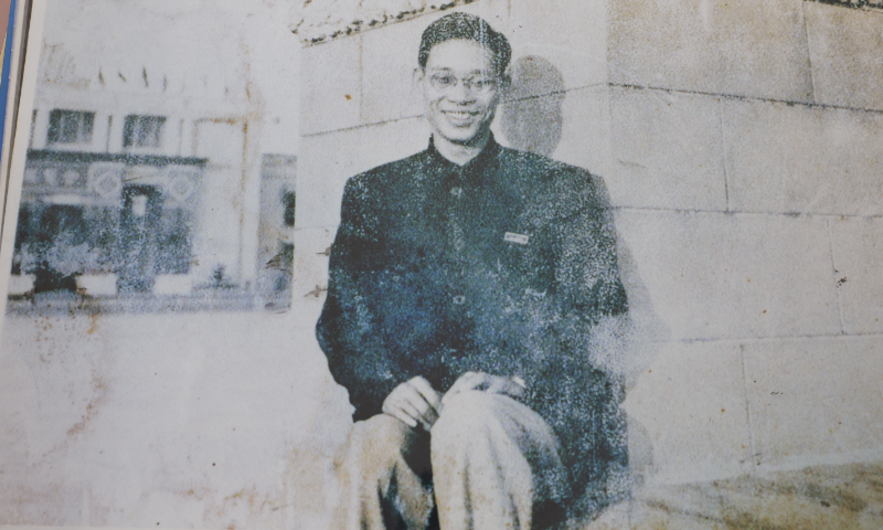 Liang Yongsong poses for a photo before the exhibition hall of the first session of the Canton Fair held in April, 1957 in Guangzhou, South China’s Guangdong Province. Photo: courtesy of Liang Yongsong