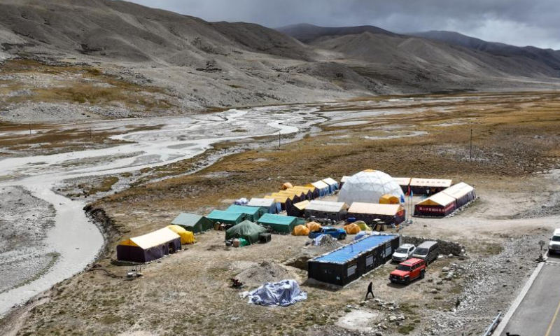 This aerial photo taken on Oct. 1, 2023 shows the Mount Cho Oyu base camp.

In the 4,950-meter-high base camp at the foot of Mount Cho Oyu, the sixth-highest mountain in the world with an altitude of 8,201 meters, Chinese research team has recently conducted an experiment on the group who rushed into the plateau region to reveal more about the interaction between a high-altitude environment and people new to it.

The team collected blood, urine, saliva, feces and other samples, measured blood pressure, and monitored the pulse wave velocity of the volunteers to provide samples for follow-up research efforts.

The 2023 Mount Cho Oyu expedition is part of the second comprehensive scientific expedition to the Qinghai-Tibet Plateau initiated in 2017. (Xinhua/Jigme Dorje)