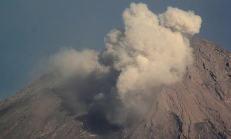 This photo taken on Oct. 1, 2023 shows volcanic materials spewing from Mount Semeru, as seen from Lumajang, East Java, Indonesia. (Photo by Dwi Sasongko/Xinhua)