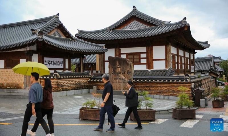 Tourists visit a Hanok village in Jeonju, South Korea, Sept. 20, 2023.(Photo: Xinhua)