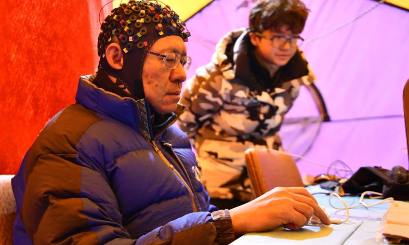 Zhu Tong, an academician with the Chinese Academy of Sciences, conducts a test at the Mount Cho Oyu base camp on Oct. 1, 2023.

In the 4,950-meter-high base camp at the foot of Mount Cho Oyu, the sixth-highest mountain in the world with an altitude of 8,201 meters, Chinese research team has recently conducted an experiment on the group who rushed into the plateau region to reveal more about the interaction between a high-altitude environment and people new to it.

The team collected blood, urine, saliva, feces and other samples, measured blood pressure, and monitored the pulse wave velocity of the volunteers to provide samples for follow-up research efforts.

The 2023 Mount Cho Oyu expedition is part of the second comprehensive scientific expedition to the Qinghai-Tibet Plateau initiated in 2017. (Xinhua/Jigme Dorje)