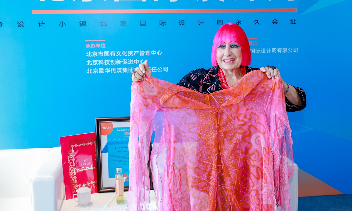 Zandra Rhodes shows her donated garments to the public at the opening ceremony of Beijing Design Week in Beijing on September 21, 2023. Photo: Courtesy of the Beijing Design Week