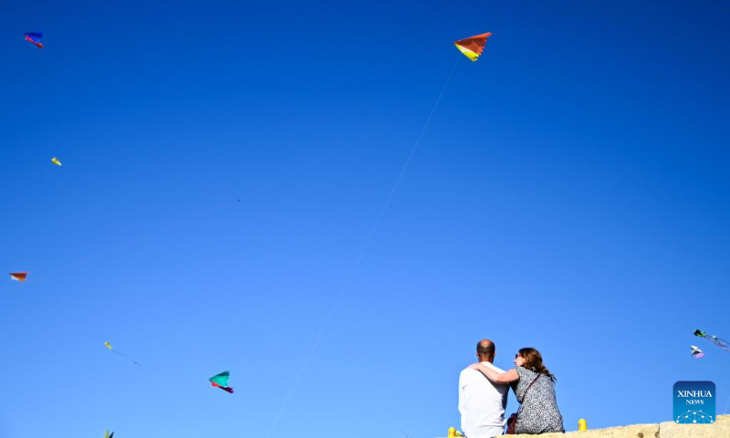 Kites fly in the sky during the 6th edition of the International Kite and Wind Festival in the village of Gharb on the island of Gozo, Malta, on Oct. 15, 2023. (Photo by Jonathan Borg/Xinhua)