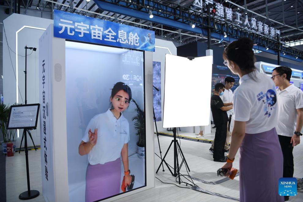 An exhibitor displays a metaverse interactive holographic module at the 2023 World Manufacturing Convention in Hefei, east China's Anhui Province, Sept. 20, 2023. The 2023 World Manufacturing Convention kicked off Wednesday in Hefei, built around the theme Intelligent manufacturing for a better future. With a record number of exhibitors, the five-day event features activities as exhibitions, summits and forums.(Photo: Xinhua)