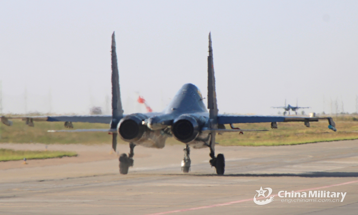 A J-11 fighter jet attached to an aviation brigade with the air force under the PLA Western Theater Command taxis on the runway during a flight training exercise on September 21, 2023. Photo:China Military