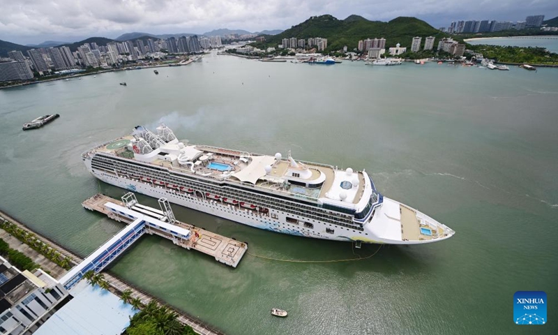 A cruise ship docks at the international cruise port in Sanya, south China's Hainan Province, Sept. 25, 2023. A cruise ship with over 1,800 passengers on board berthed on Monday at the international cruise port in Sanya, a resort city in south China's Hainan Province, marking the full resumption of international cruise routes to and from Sanya.(Photo: Xinhua)