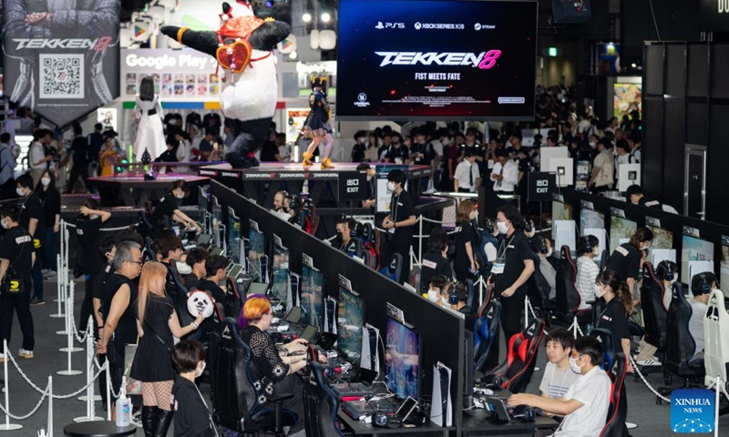 People try games from Bandai Namco at Tokyo Game Show 2023 in Chiba Prefecture, Japan, Sept. 21, 2023. The four-day Tokyo Game Show 2023 opened at Makuhari Messe in Japan's Chiba Prefecture on Thursday, attracting 787 exhibitors from 44 countries and regions. (Photo: Xinhua)