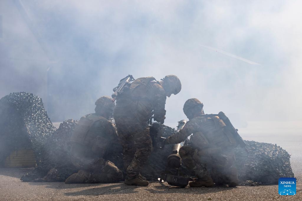 Soldiers demonstrate the destruction of a tank with light anti-tank weapons during the SOBRA international fair in Gornja Radgona, Slovenia, on Sept. 21, 2023. Slovenia will increase its defense budget, the country's Minister of Defense Marjan Sarec said at the biennial four-day SOBRA international fair focusing on the areas of defense, security, protection and rescue that opened on Thursday.(Photo: Xinhua)