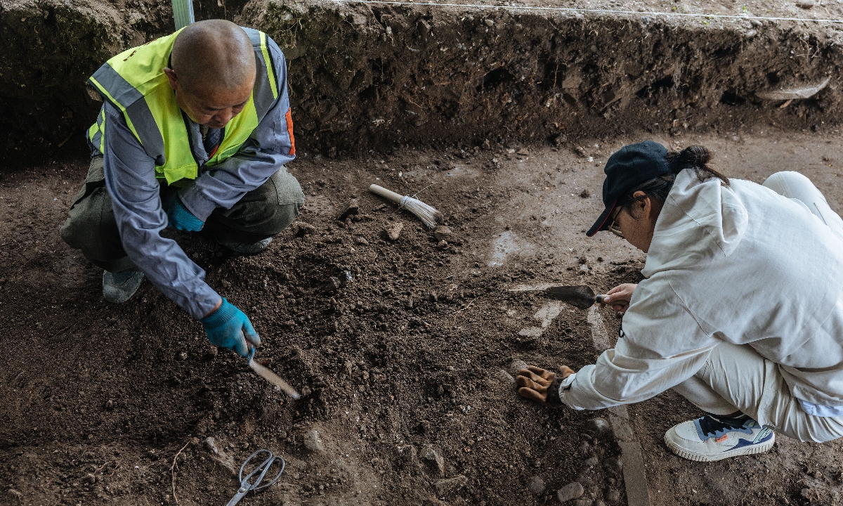 A researcher and technician work on site at the Danbo Ningjing archaeological site on September 24, 2023. Photo: Li Hao/GT