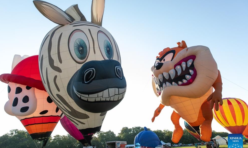 Hot air balloons are seen at the Plano Balloon Festival in Plano, Texas, the United States, on Sept. 23, 2023. The Plano Balloon Festival is held here from Sept. 21 to 24. (Photo by Dan Tian/Xinhua)