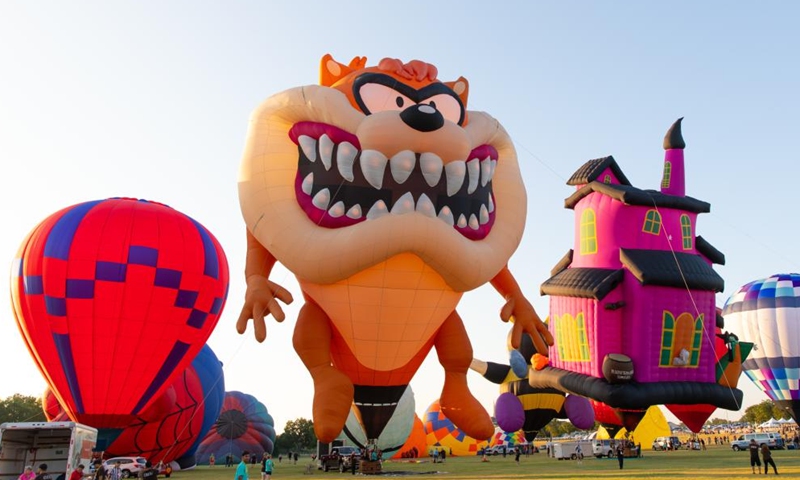 Hot air balloons are seen at the Plano Balloon Festival in Plano, Texas, the United States, on Sept. 23, 2023. The Plano Balloon Festival is held here from Sept. 21 to 24. (Photo by Dan Tian/Xinhua)