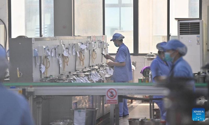 Employees work on a production line of Guangxi Liuyao Group Co., Ltd., a pharmaceutical company, in Liuzhou City, south China's Guangxi Zhuang Autonomous Region, Sept. 21, 2023. In recent years, Liuzhou has been promoting the cultivation and expansion of emerging industries such as new-energy, intelligent equipment and smart home appliances manufacturing, biomedicine and new-generation information technology. (Xinhua/Huang Xiaobang)