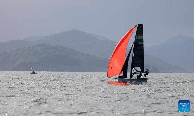 Ganapathy Kelapanda Chengappa/Varun Ashok Thakkar of India compete during the Men's Skiff 49er Race of sailing at the 19th Asian Games in Ningbo, east China's Zhejiang Province, Sept. 24, 2023. (Xinhua/Zhang Tao)