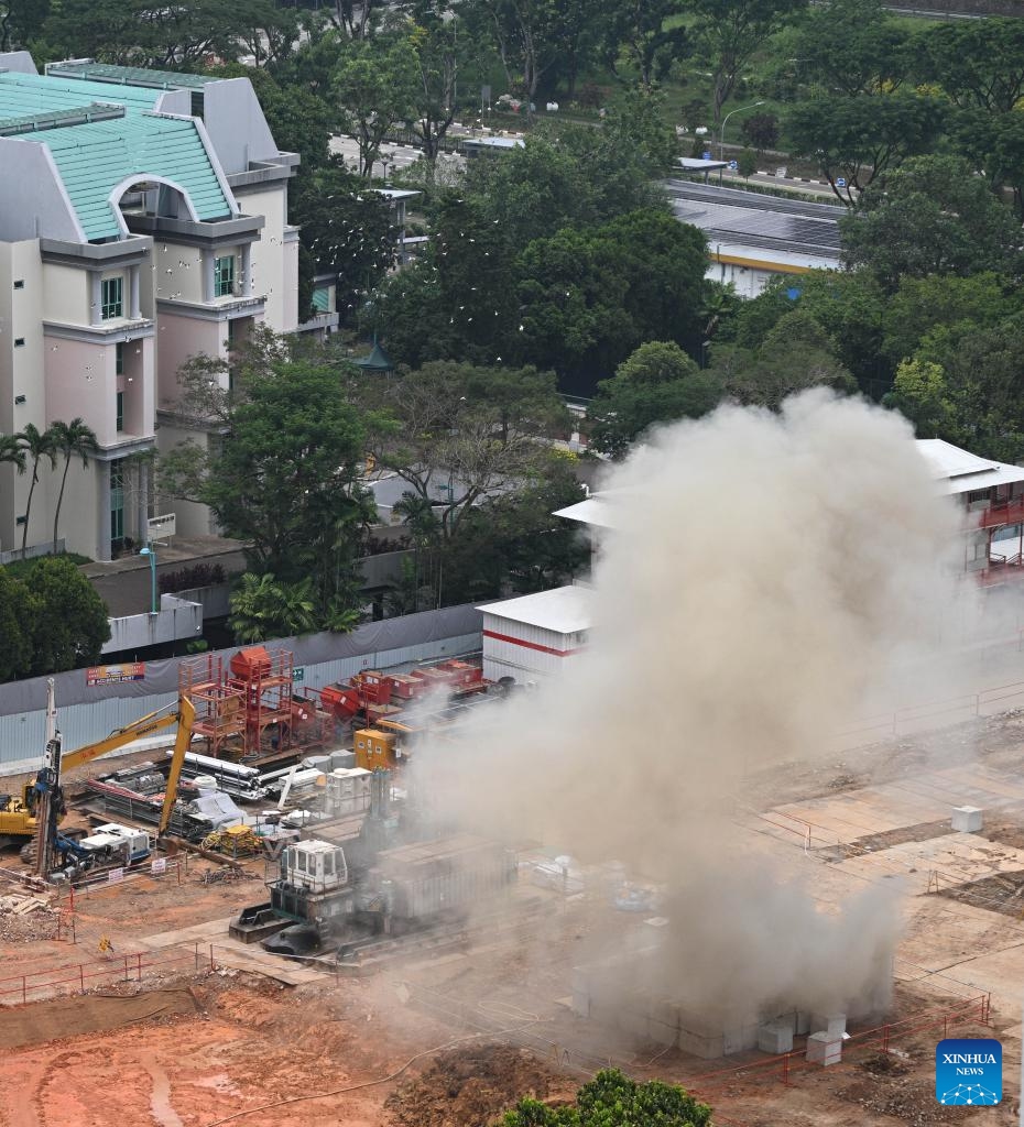 Smoke rises as a 100-kilogram World War II bomb is detonated by members of the Singapore Armed Forces (SAF) at a construction site in Singapore, Sept. 26, 2023. Singapore's military on Tuesday detonated an unexploded World War II bomb after evacuating over 4,000 residents nearby.(Photo: Xinhua)