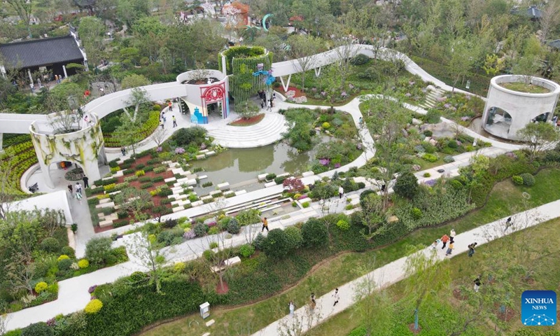 This aerial photo taken on Sept. 26, 2023 shows people visiting a garden at the 14th China (Hefei) International Garden Expo in Hefei, east China's Anhui Province. The expo opened in Hefei on Tuesday, attracting 38 cities to showcase the characteristics of their gardens.(Photo: Xinhua)