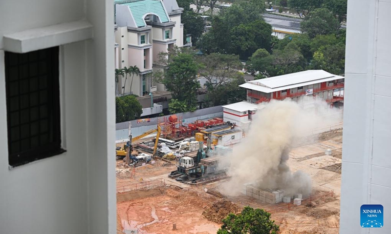 Smoke rises as a 100-kilogram World War II bomb is detonated by members of the Singapore Armed Forces (SAF) at a construction site in Singapore, Sept. 26, 2023. Singapore's military on Tuesday detonated an unexploded World War II bomb after evacuating over 4,000 residents nearby.(Photo: Xinhua)