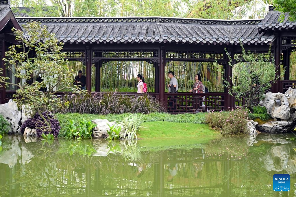 People visit the Yangzhou garden at the 14th China (Hefei) International Garden Expo in Hefei, east China's Anhui Province, Sept. 26, 2023. The expo opened in Hefei on Tuesday, attracting 38 cities to showcase the characteristics of their gardens.(Photo: Xinhua)