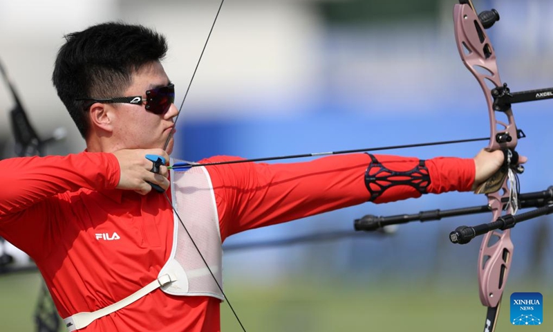 Wei Shaoxuan of China competes during the Recurve Mixed Team 1/8 Elimination of Archery between team China and team China's Hong Kong at the 19th Asian Games in Hangzhou, east China's Zhejiang Province, Oct. 2, 2023. (Xinhua/Meng Chenguang)