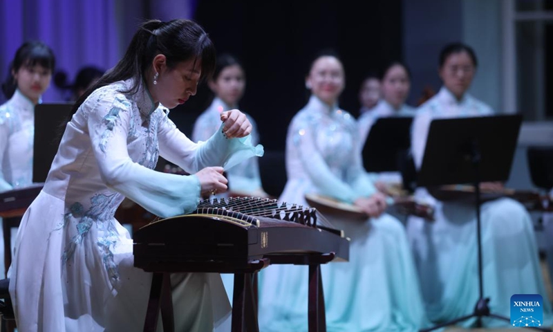 A member of China's Nanjing University's Traditional Instruments Orchestra plays Guzheng during a concert of Chinese classical music in Ljubljana, Slovenia, on Oct. 2, 2023. Photo: Xinhua