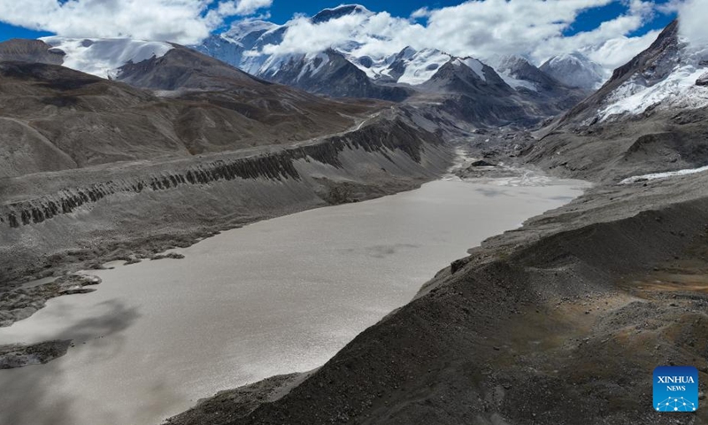 This aerial photo taken on Sept. 29, 2023 shows a proglacial lake in the Mount Cho Oyu region. An 18-member expedition team successfully reached on Sunday the summit of Mount Cho Oyu, also known as Mt. Qowowuyag, which soars to 8,201 meters above sea level, to carry out scientific research. It was the first time Chinese scientists scaled a peak exceeding 8,000 meters in altitude apart from Mt. Qomolangma, the world's highest summit. Photo: Xinhua