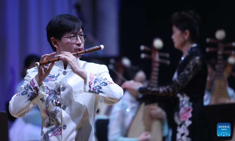 A member of China's Nanjing University's Traditional Instruments Orchestra plays flute during a concert of Chinese classical music in Ljubljana, Slovenia, on Oct. 2, 2023. Photo: Xinhua