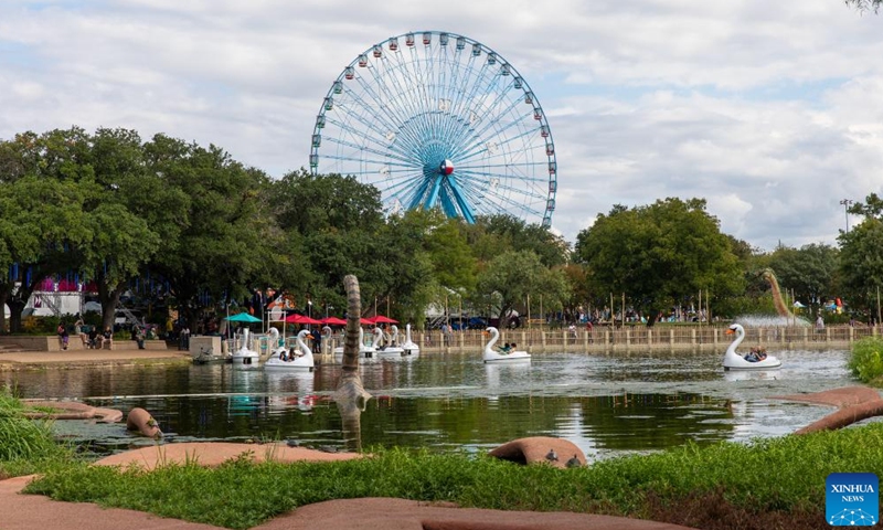 This photo taken on Oct. 5, 2023 shows a ferris wheel at State Fair of Texas in Dallas, the United States. The annual State Fair of Texas is held in Dallas from Sept. 29 till Oct. 22. (Photo by Dan Tian/Xinhua)