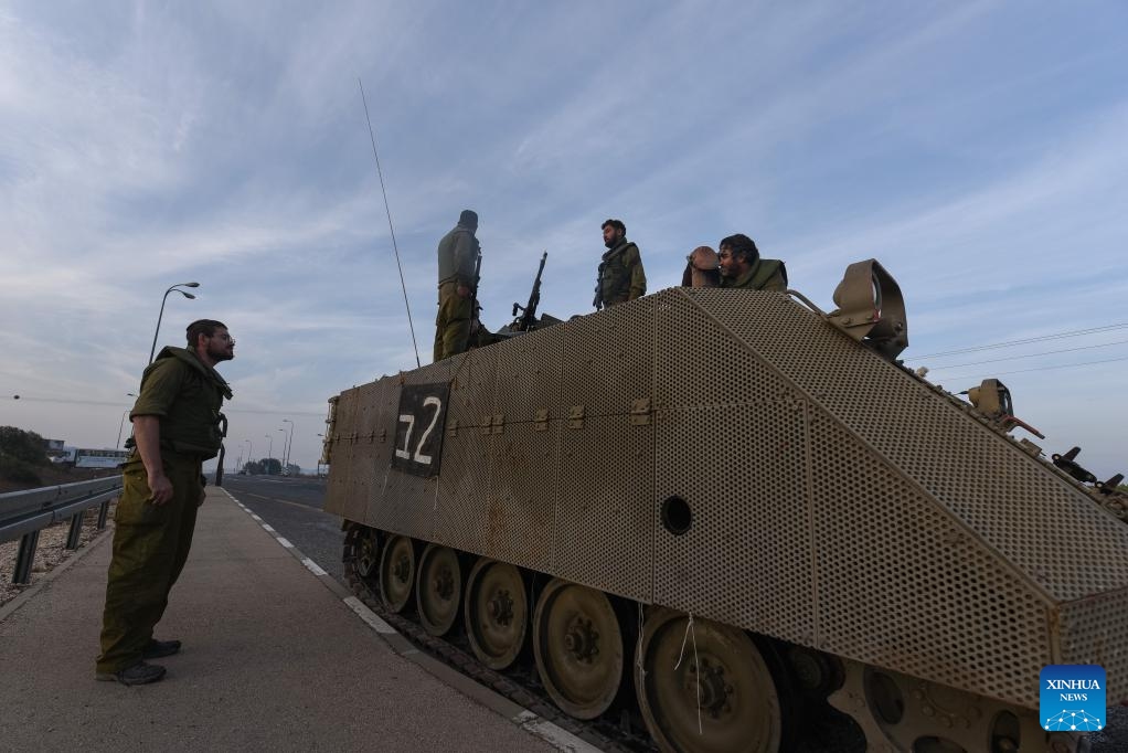 Israeli soldiers mass in northern Israel near the border with Lebanon on Oct. 8, 2023. Dozens of rockets and heavy artillery shells were fired toward Israeli positions on the Shebaa Farms, a disputed strip of land at the intersection of the Lebanese-Syrian border and the Israeli-annexed Golan Heights, early Sunday morning, Lebanese army intelligence sources confirmed to Xinhua.(Photo: Xinhua)