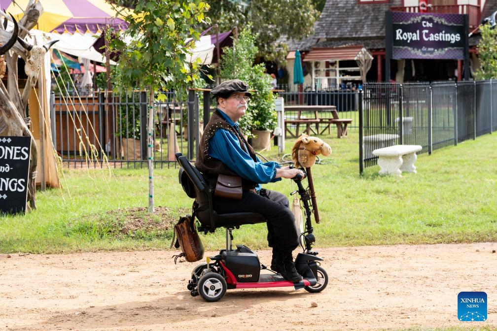 A person dressed in costumes takes part in Texas Renaissance Festival in Todd Mission, Texas, the United States, Oct. 7, 2023. Texas Renaissance Festival kicked off in the western U.S. state of Texas on Saturday, bringing the magic of the Renaissance time to life through Nov. 26.(Photo: Xinhua)