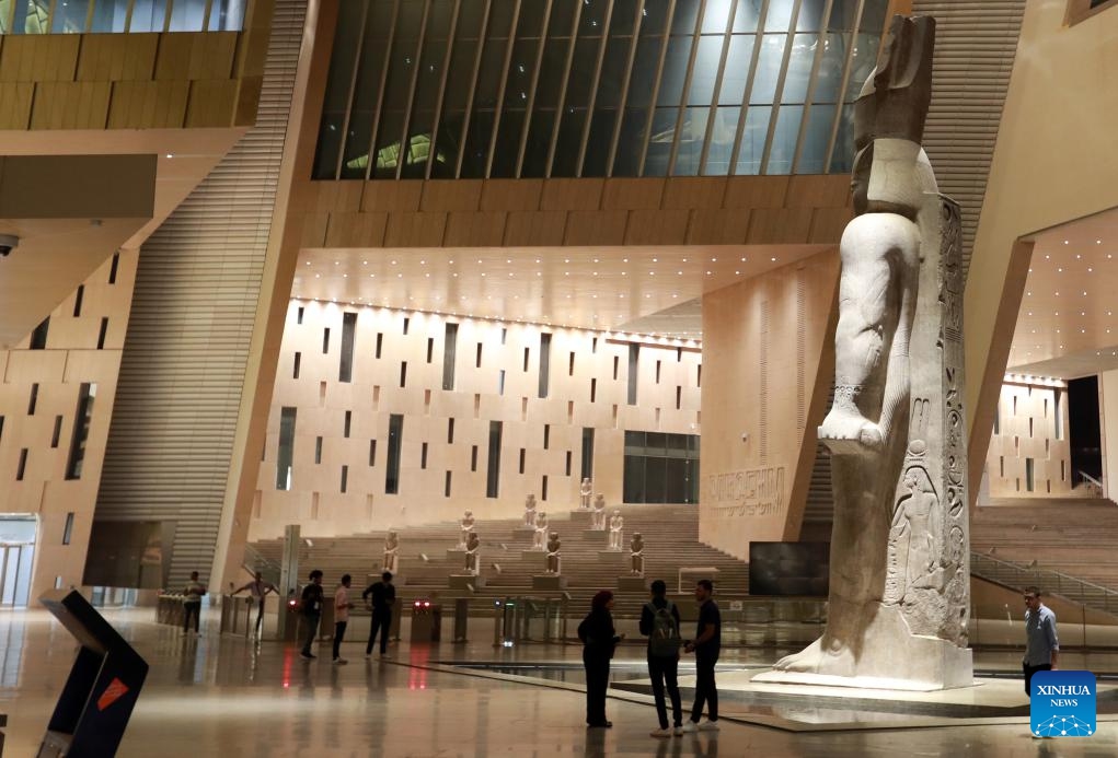 This photo taken on Oct. 8, 2023 shows the night view of the grand hall of the Grand Egyptian Museum in Giza, Egypt. Constructed on approximately 500,000 square meters, the Grand Egyptian Museum is located nearby the Giza Pyramids. It will be, after opening, one of the largest museums in the world presenting a heritage of ancient civilizations.(Photo: Xinhua)