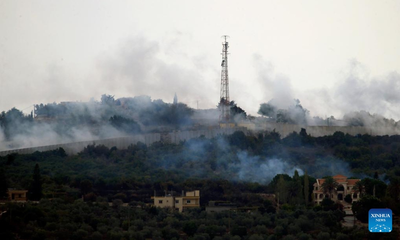 Photo taken on Oct. 11, 2023 shows smoke of Israeli artillery shelling in the town of Al-Dhayra, Lebanon. The Israeli strikes on border villages and towns in southern Lebanon on Wednesday morning injured three people and caused heavy damage to property and agricultural fields, Lebanon's National News Agency (NNA) reported.(Photo: Xinhua)