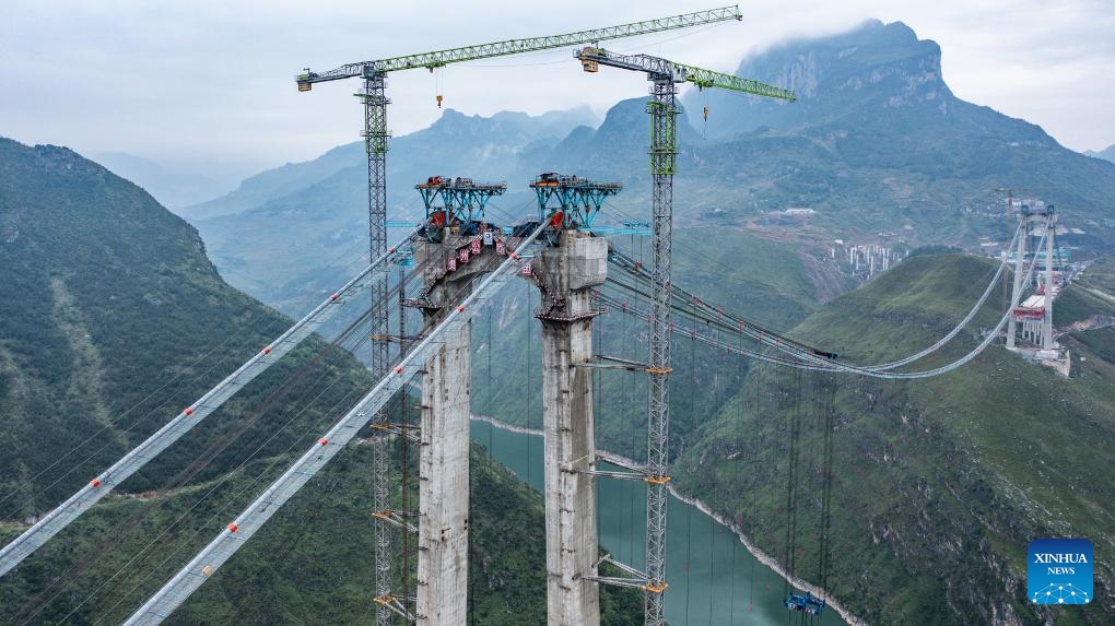 This aerial photo taken on Oct. 11, 2023 shows the construction site of Zangke River bridge on Nayong-Qinglong Expressway in southwest China's Guizhou Province. The 162.2-kilometer Nayong-Qinglong Expressway will allow vehicles to run at 100 kilometers per hour when accomplished.(Photo: Xinhua)