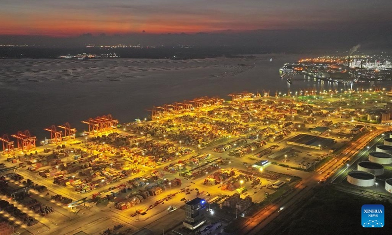 This aerial photo taken on Oct. 3, 2023 shows the night view of the Qinzhou Port in Qinzhou, south China's Guangxi Zhuang Autonomous Region. (Photo: Xinhua）