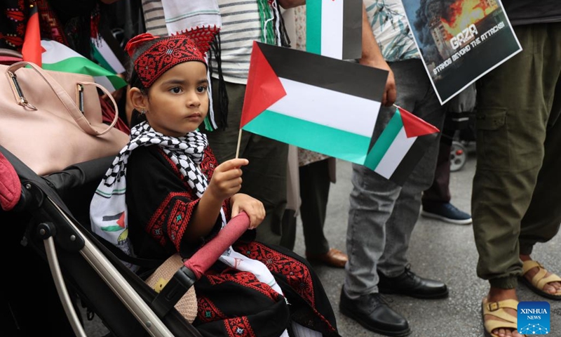 People gather in a rally to support Palestinians in downtown Rabat, Morocco, on Oct. 15, 2023.(Photo: Xinhua)