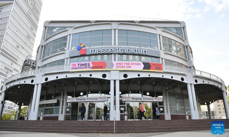 Visitors walk into the exhibition hall of the 75th Frankfurt Book Fair in Frankfurt, Germany, Oct. 18, 2023. The 75th Frankfurt Book Fair opened its doors to visitors on Wednesday. The book fair focuses on the most pressing issues related to literature and society, its organizers said(Photo: Xinhua)