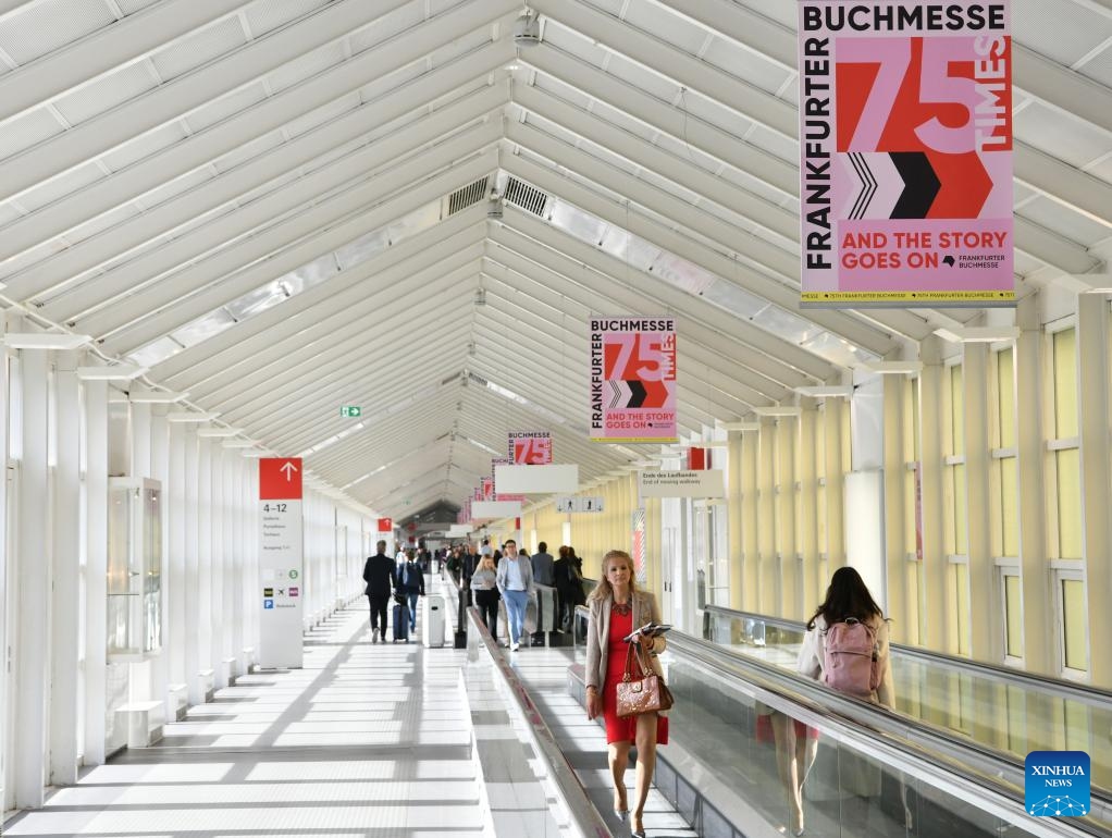 People visit the 75th Frankfurt Book Fair in Frankfurt, Germany, Oct. 18, 2023. The 75th Frankfurt Book Fair opened its doors to visitors on Wednesday. The book fair focuses on the most pressing issues related to literature and society, its organizers said.(Photo: Xinhua)