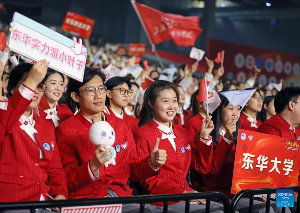 This photo taken on Oct. 17, 2023 shows volunteers at the swearing-in ceremony for volunteers of the upcoming sixth China International Import Expo (CIIE) in Shanghai, east China. A swearing-in ceremony for volunteers of the sixth CIIE was held at the National Exhibition and Convention Center (Shanghai) on Tuesday. Up until now, the sixth CIIE has recruited over 5,700 volunteers from 40 universities in Shanghai.(Photo: Xinhua)