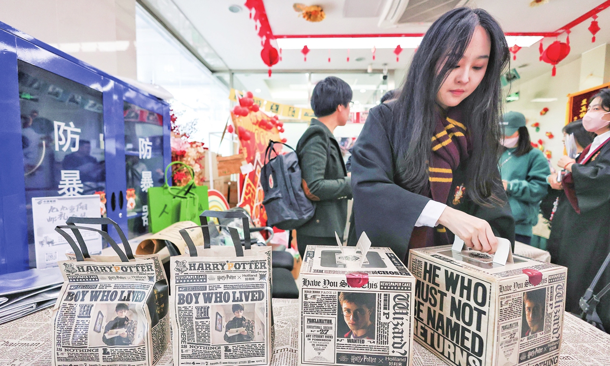 The Beijing Municipal Postal Administration holds a global launch of the new Harry Potter stamps at the Di'anmen Branch in Beijing on October 19, 2023. China Post is the only authorized party to issue the Harry Potter series of stamps released by the British Royal Mail. Photo: cnsphoto