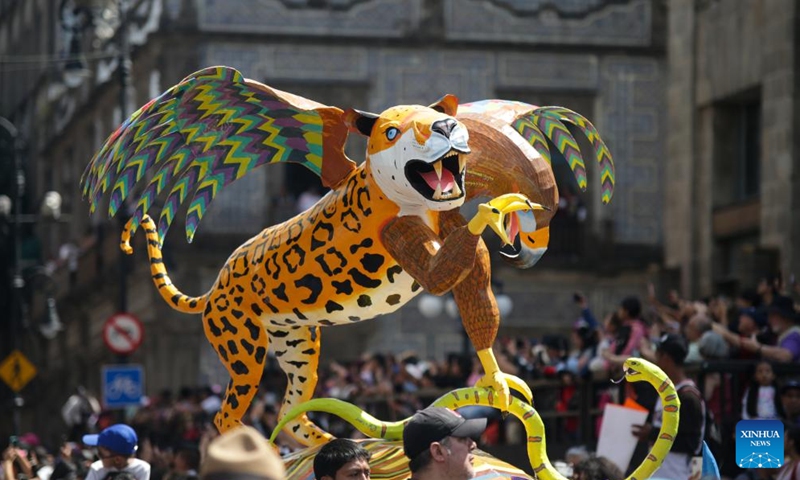 A sculpture of an alebrije is seen during the Monumental Alebrijes Parade 2023 in Mexico City, capital of Mexico, Oct. 21, 2023. Alebrijes are brightly colored folk art sculptures of fantastical creatures. (Photo: Xinhua)