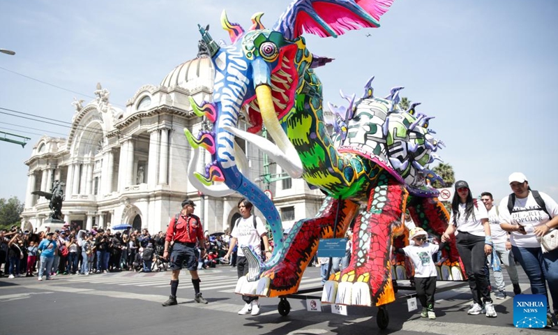 A sculpture of an alebrije is seen during the Monumental Alebrijes Parade 2023 in Mexico City, capital of Mexico, Oct. 21, 2023. Alebrijes are brightly colored folk art sculptures of fantastical creatures. (Photo: Xinhua)