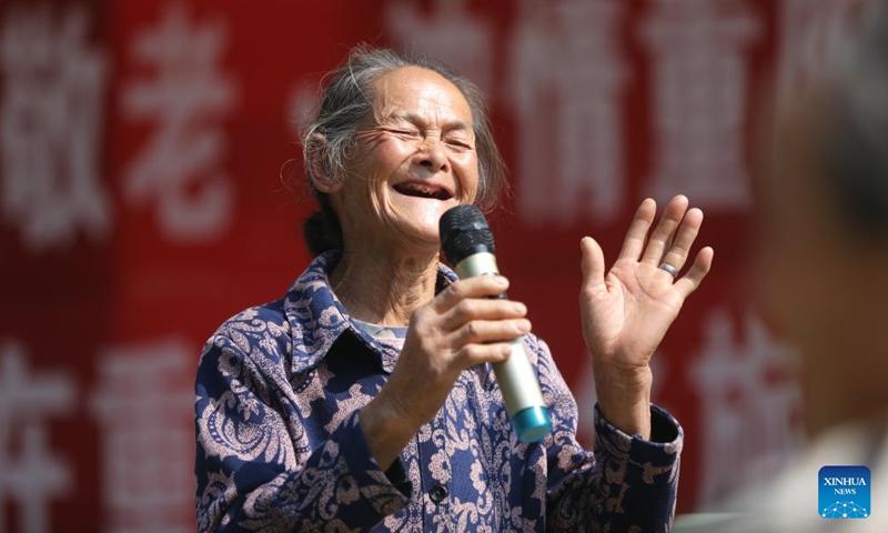 An elder performs at a Chongyang Festival activity in Gaobei Village of Ganxi Township in Shibing County, Qiandongnan Miao and Dong Autonomous Prefecture, southwest China's Guizhou Province, Oct. 22, 2023. The Chongyang Festival, also known as the Double Ninth Festival, is an annual festival to show respect and care for the elderly throughout China. The festival falls on the ninth day of the ninth Chinese lunar month, which is October 23 this year. (Photo: Xinhua)