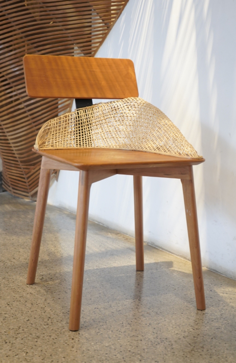 A wooden chair with bamboo weaving design by Zhang Dingjuan Photo: Courtesy of Zhang Dingjuan