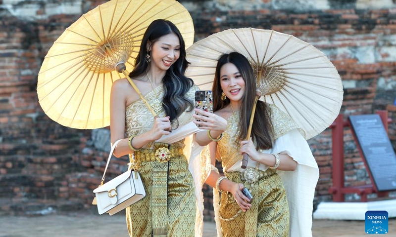 Tourists are seen at the Ayutthaya Historical Park in Ayutthaya, Thailand, Oct. 22, 2023. Located in central Thailand, Ayutthaya was founded around 1350 and is the famous ancient capital of Thailand. In 1991, the ancient city of Ayutthaya was listed as a UNESCO World Heritage Site with a protected area of 289 hectares.(Photo: Xinhua)