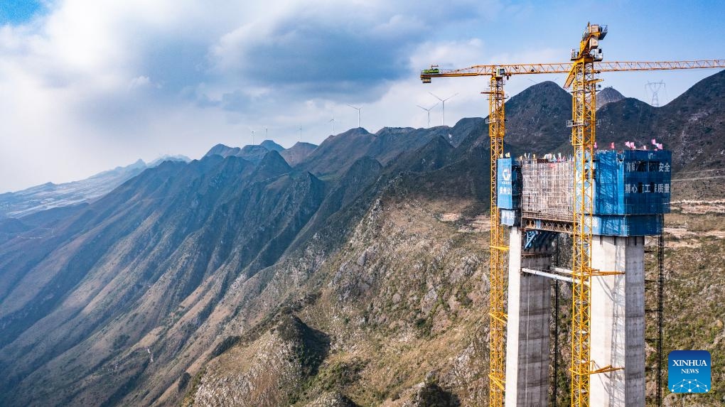 This aerial photo taken on Oct. 24, 2023 shows a main tower of the Huajiang grand canyon bridge in southwest China's Guizhou Province. The last main tower of the Huajiang grand canyon bridge was completed on Tuesday in southwest China's Guizhou Province, marking a major milestone in the building of the world's highest bridge.(Photo: Xinhua)