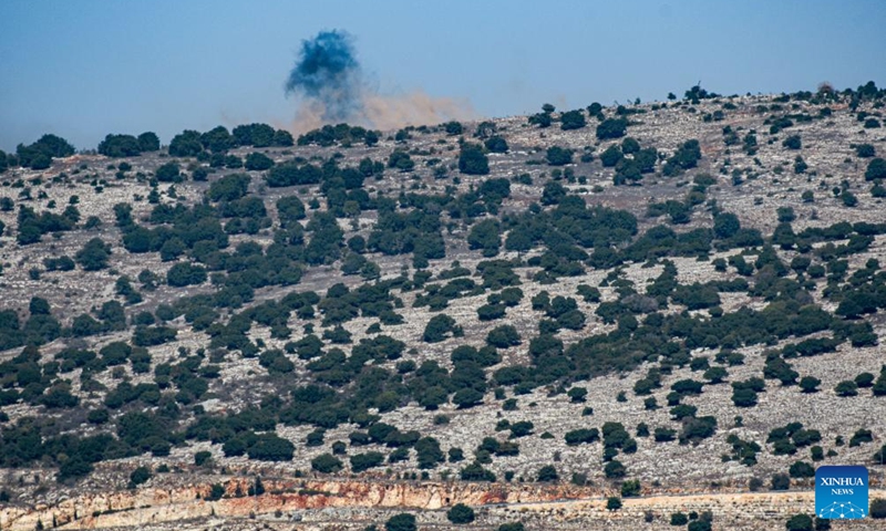 Smoke rises from a hill of a southern Lebanese village, as seen from Israeli Moshav of Avivim in northern Israel bordering Lebanon, following artillery shelling by the Israeli army, on Oct. 25, 2023.(Photo: Xinhua)