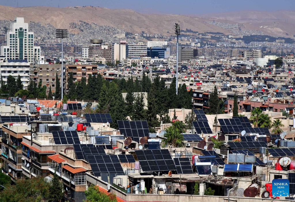 Solar panels are seen on rooftops in Damascus, Syria, Oct. 25, 2023.(Photo: Xinhua)