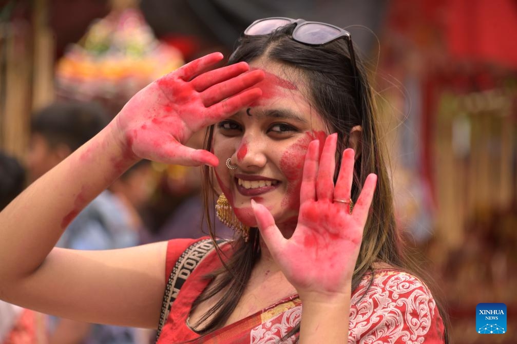 A woman participates in a celebration of Durga Puja festival in Dhaka, Bangladesh, Oct. 24, 2023.(Photo: Xinhua)