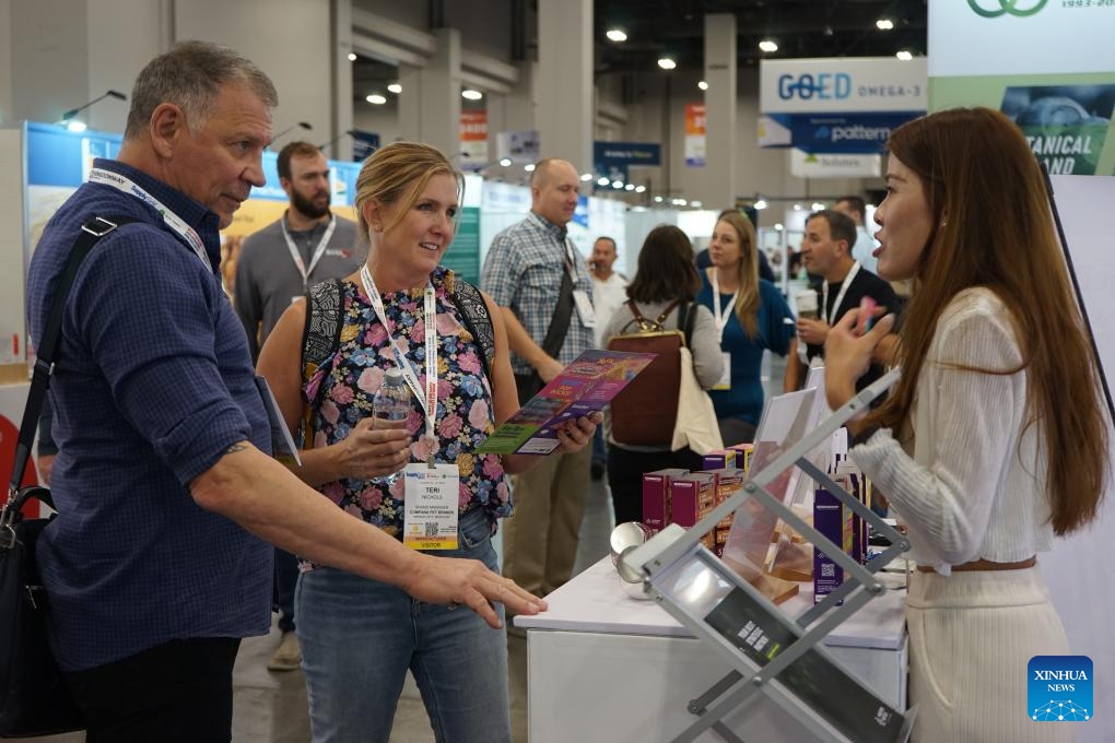 People visit SupplySide West 2023 in Las Vegas, Nevada, the United States, on Oct. 25, 2023. SupplySide West 2023, one of the top conventions in the international healthcare ingredients industry, kicked off in Las Vegas on Wednesday.(Photo: Xinhua)