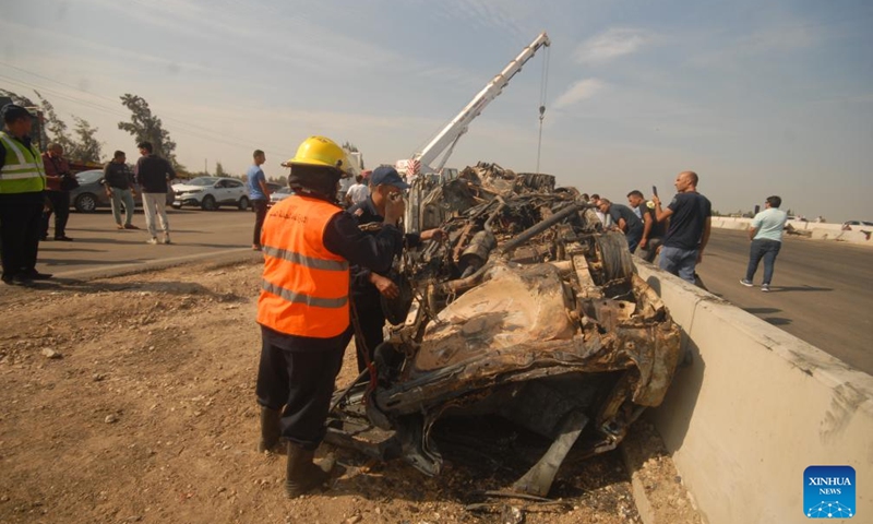 People gather around destroyed vehicles at the scene of multiple vehicle collisions in Beheira governorate, Egypt, Oct. 28, 2023. At least 35 people were killed and 53 others injured Saturday in multiple vehicle collisions on a desert road in Egypt's Beheira governorate, state-run Ahram newspaper reported. (Photo: Xinhua)