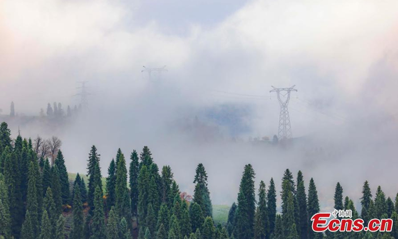 Spectacular landscape of fluffy clouds floating over Tianshan Mountains after a rainfall in northwest China's Xinjiang Uyghur Autonomous Region, Oct. 25, 2023.(Photo: ecns.cn)