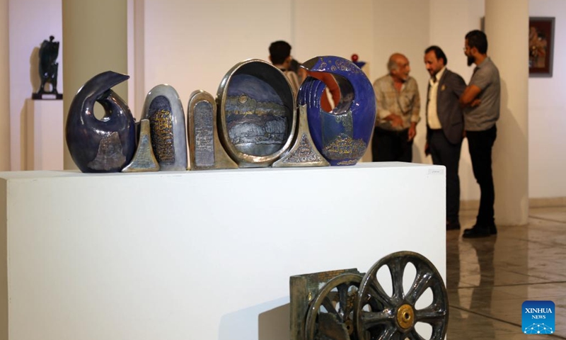 People visit a ceramics exhibition organized by Iraqi Plastic Artists Society in Baghdad, Iraq, Oct. 28, 2023. (Photo: Xinhua)